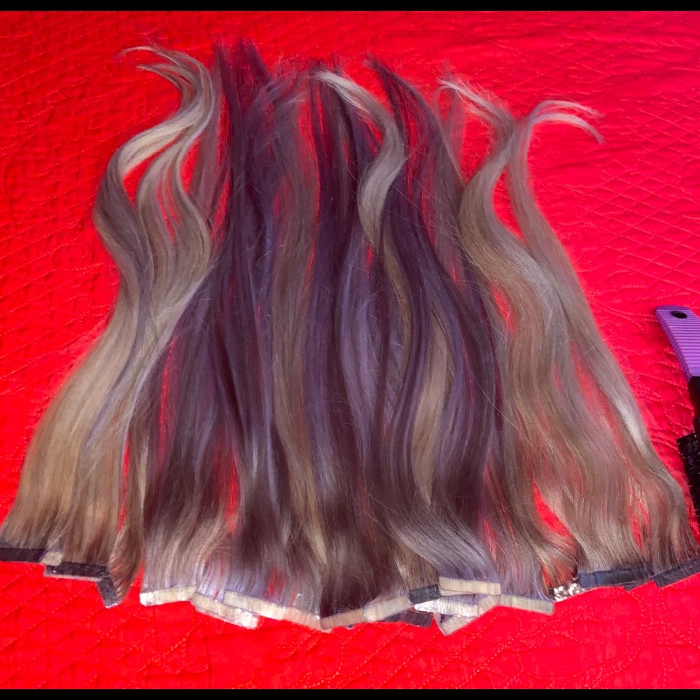 Two packages of 100% human hair extensions